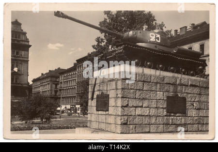 Monument to Soviet Tank Crews (Památník sovětských tankistů) in Prague, Czechoslovakia, depicted in the Czechoslovak vintage postcard issued before 1952. The monument was unveiled in July 1945 to commemorate the Soviet tank T-34 number 24 which entered into Prague as the first one at the morning on 9 May 1945. In fact a Soviet heavy tank IS-2 was installed on the pedestal and the number was wrongly changed to 23. The monument later known as the Pink Tank was removed in June 1991. Courtesy of the Azoor Postcard Collection. Stock Photo