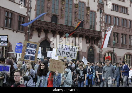Frankfurt, Germany. 23rd Mar, 2019. Protesters march with signs through Frankfurt. More than 15,000 protesters marched through Frankfurt calling for the Internet to remain free and to not to pass the new EU Copyright Directive into law. The protest was part of a Germany wide day of protest against the EU directive. Credit: Michael Debets/Pacific Press/Alamy Live News