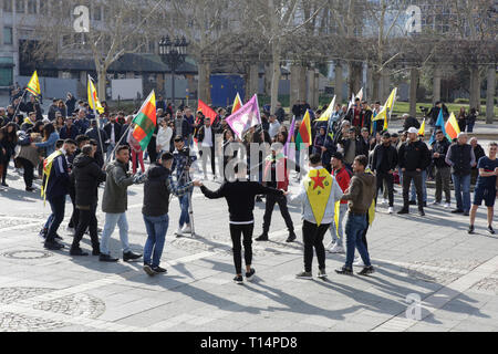 Frankfurt, Germany. 23rd Mar, 2019. Kurds dance at the opening rally. Several thousand Kurds marched through Frankfurt, to celebrate Nawroz, the Kurdish New Year's festival. It was the central celebration for Germany and was held under the motto “Free Abdullah Ocalan”, the leader of the PKK (Kurdistan Workers' Party). Credit: Michael Debets/Pacific Press/Alamy Live News Stock Photo