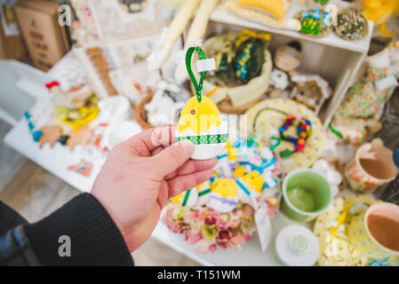 walking by market looking easter holidays decoration. first person view Stock Photo