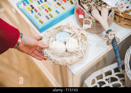 walking by market looking easter holidays decoration. first person view Stock Photo