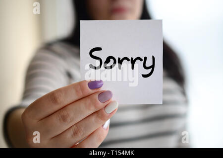 Sad Girl holding Sorry poster Stock Vector Art & Illustration, Vector ...