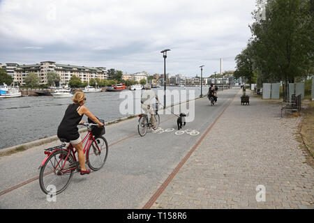 STOCKHOLM, SWEDEN 20180707  Cyclists in Hammarby Sjöstad, Stockholm. Photo Jeppe Gustafsson Stock Photo