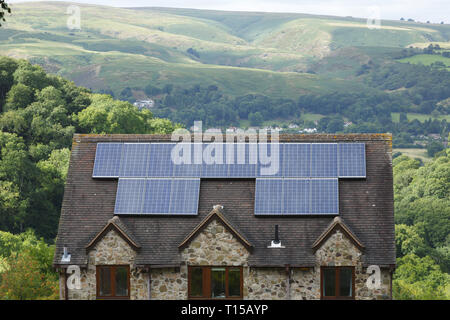 Shropshire, UK - September 10, 2013. Solar panels fitted to the roof of a house in rural England. Stock Photo