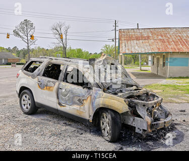 Burned out car or suv on the side of the road in rural Alabama, USA. Stock Photo