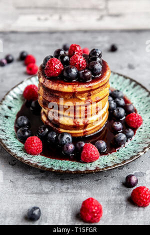 pancakes with blueberries & raspberries Stock Photo - Alamy