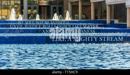 Reflecting pool with quote by Martin Luther King, Jr. at The King Center, site of the Martin Luther King and Coretta Scott King tomb in Atlanta, GA. Stock Photo