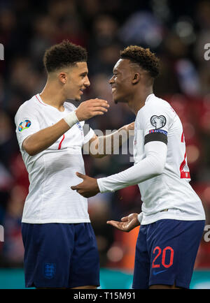 London, UK. 22nd Mar, 2019. Jadon Sancho (Borussia Dortmund) & Callum Hudson-Odoi (Chelsea) (20) of England at full time during the UEFA 2020 Euro Qualifier match between England and Czech Republic at Wembley Stadium, London, England on 22 March 2019. Photo by Andy Rowland/PRiME Media Images. Credit: Andrew Rowland/Alamy Live News Stock Photo