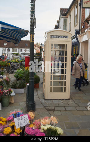 Cream Telephone box of Hull Telephone Company Now KC communications (KCom), in Saturday Market, Beverley, East Riding of Yorkshire, England, UK, Gb. Stock Photo