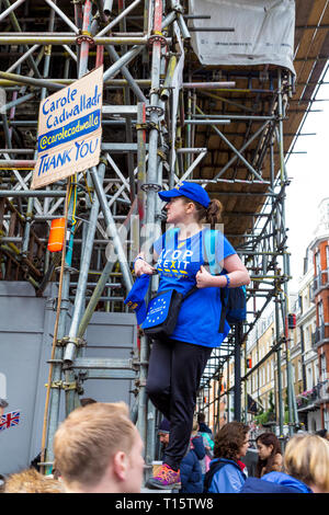 London, UK. 23rd Mar 2019.  Over a million people march for the People’s Vote, for a second referendum on Brexit, Carole Cadwalladr standing on scaffolding Credit: Nathaniel Noir/Alamy Live News Stock Photo