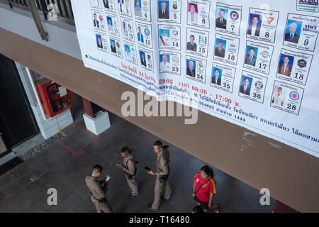 Chalong, Thailand. 24th Mar 2019. A board with profiles of candidates at a polling station during Thailand General Election 2019 in Chalong, Phuket, Thailand. Credit: Lou Linwei/Alamy Live News Stock Photo