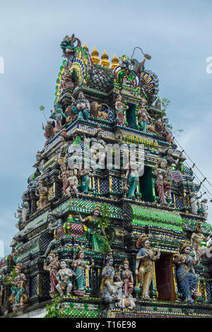 The unique Arulmigu Sri Rajakaliamman Glass Temple in Johor Bahru, Malaysia. The interior is completely covered in glass tiles. Gopuram tower. Stock Photo