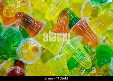 A pile of multi-colored jello cups at a party in Johor Bahru, Malaysia. Stock Photo