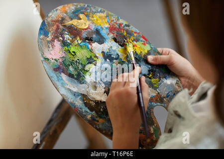 Little Artist holding palette Stock Photo