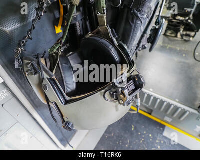 Image of a pilot's helmet from a military transport plane. Stock Photo