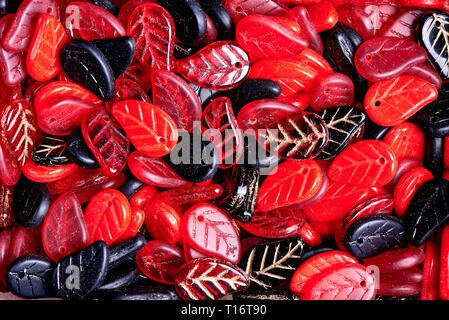 Background from colored shiny decorative leaves close-up. Stock Photo