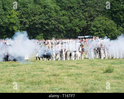 Waterloo, Belgium - June 18 2017: French soldiers firing a musket volley during the re-enactment of the battle of Waterloo. Stock Photo