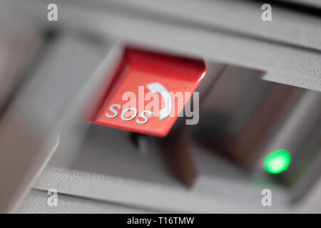 Emergency sos button close up which is used for help after car accident Stock Photo