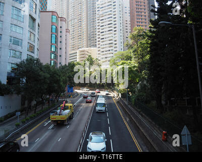 Central, Hong Kong - November 1, 2017: As the rush hour approaches, the traffic on Garden Road gets busier. Stock Photo