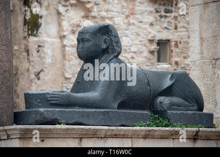 Croatia, Split - June 2018: Ancient Egyptian sphinx in the square of the Diocletian Palace in Split. The Sphinx was damaged during renovation works. Stock Photo