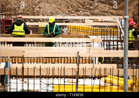 construction workers working on a new building Stock Photo