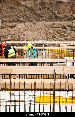 construction workers working on a new building Stock Photo