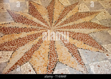 Croatia, Split - June 2018: Roman floor in Tesserai.  Typically Roman this sun busrt patterened floor made of tiny tiles is found in the Diocletians P Stock Photo