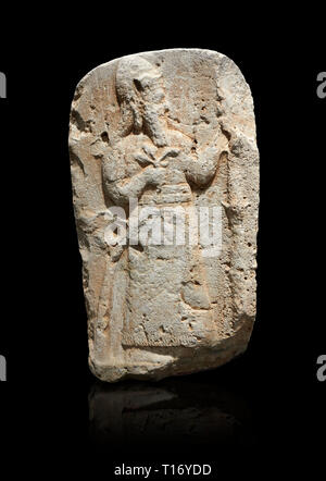 Hittite monumental relief sculpture of a lion. Late Hittite Period - 900-700 BC. Adana Archaeology Museum, Turkey. Against a black background Stock Photo