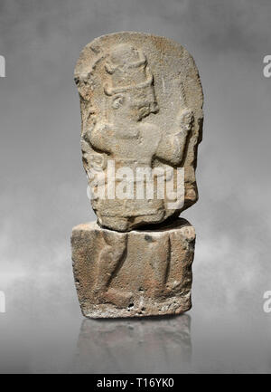 Hittite monumental relief sculpture of a god probably about to kill a lion (missing) with his axe. Late Hittite Period - 900-700 BC. Adana Archaeology Stock Photo