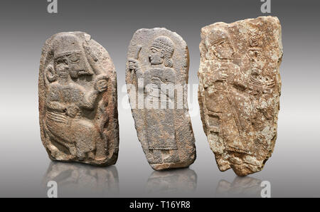 Hittite monumental relief sculptures, 900 - 700 BC, from Adana Archaeology Museum, Turkey. Against a grey background Stock Photo