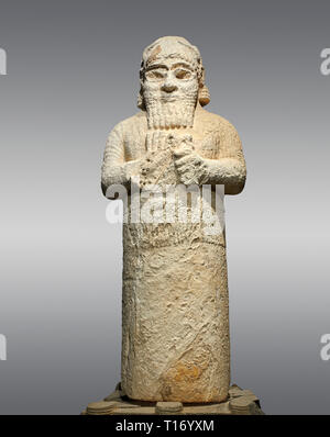 Hittite monumental statue probably of Tarhunda, the Storm God, standing on a cart being pulled by two bulls. Adana Archaeology Museum, Turkey. Against Stock Photo