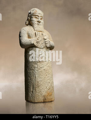 Hittite monumental statue probably of Tarhunda, the Storm God, standing on a cart being pulled by two bulls. Adana Archaeology Museum, Turkey. Stock Photo