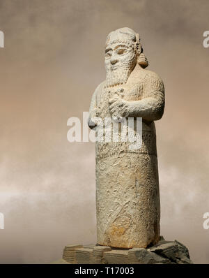 Hittite monumental statue probably of Tarhunda, the Storm God, standing on a cart being pulled by two bulls. Adana Archaeology Museum, Turkey. Stock Photo