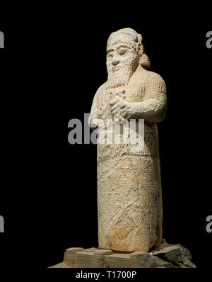 Hittite monumental statue probably of Tarhunda, the Storm God, standing on a cart being pulled by two bulls. Adana Archaeology Museum, Turkey. Against Stock Photo