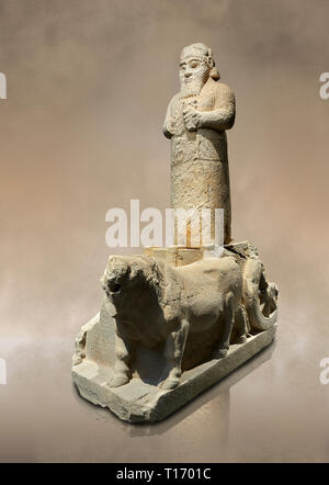 Hittite monumental statue probably of Tarhunda, the Storm God, standing on a cart being pulled by two bulls. Adana Archaeology Museum, Turkey. Stock Photo