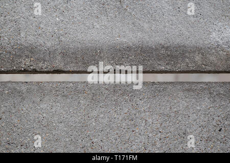A horizontal hole or gap between two concrete slabs at the Berlin Wall (Berlin Wall Memorial - Berliner Mauer) in Berlin, Germany. Stock Photo
