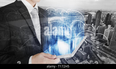 Smart technology, smart business, internet 5G and network connection. Businessman working on digital tablet with futuristic networking technology Stock Photo