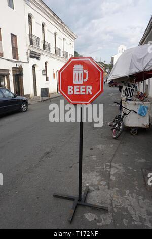 Red Beer Stop Sign outside a Cafe in Calle 5, Popayan, Colombia Stock Photo