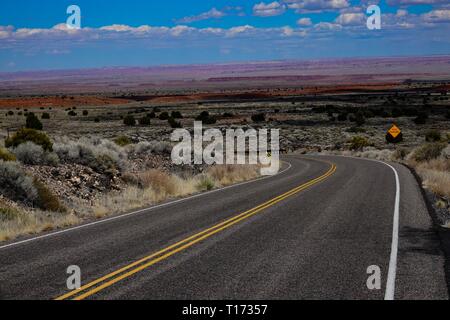 A road winds through the Painted Desert in Northern Arizona. Stock Photo