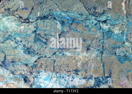 natural mineral grey stone with blue streaks as texture or background Stock Photo
