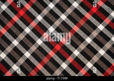 Tartan plaid natural cotton fabric. Seamless tiles texture for the background. Stock Photo