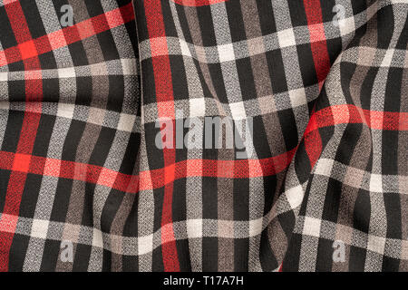 Tartan plaid natural cotton fabric. Seamless tiles texture for the background. Stock Photo