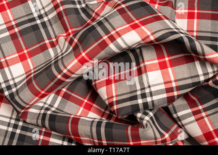 Tartan plaid natural cotton fabric. Seamless tiles texture for the background. Stock Photo