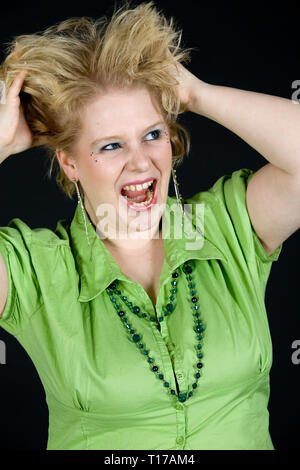 A young woman, crazy for joy. Stock Photo