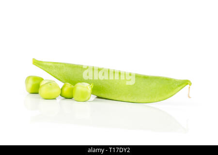 One whole green sugar snap pea pod with three peas isolated on white background Stock Photo