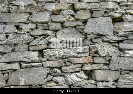 Traditional dry stone wall near Rhoscolyn, Anglesey, Wales, UK Stock Photo