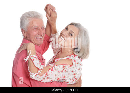 Happy senior couple dancing isolated on white background Stock Photo
