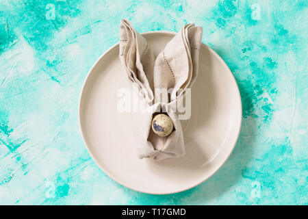 Holidays background. Easter table setting. Minimal style. Stock Photo