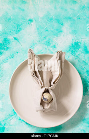 Holidays background. Easter table setting. Minimal style. Stock Photo
