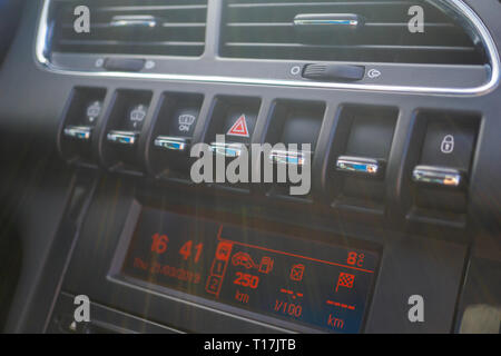 Car conditioner. The air flow inside the car. Detail interior. Air ducts, deflectors on the car panel. Stock Photo